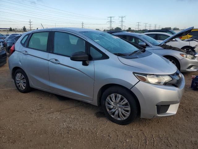 JHMGK5H54GX021035 - 2016 HONDA FIT LX SILVER photo 4