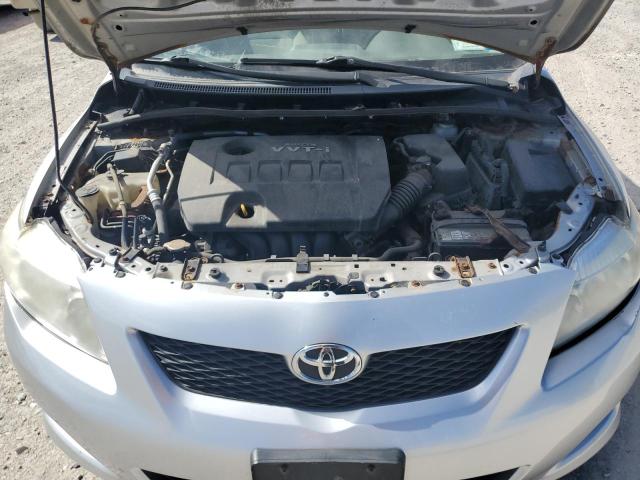 1NXBU4EE3AZ322338 - 2010 TOYOTA COROLLA BASE SILVER photo 11