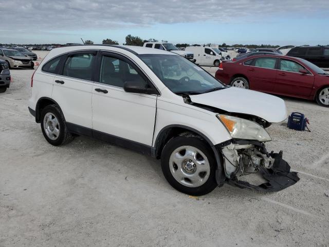 5J6RE3H3XBL016825 - 2011 HONDA CR-V LX WHITE photo 4