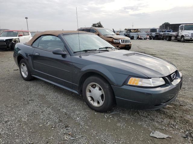 1FAFP444XXF134649 - 1999 FORD MUSTANG GREEN photo 4