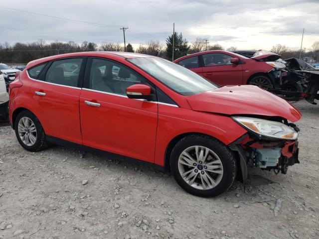 1FAHP3M20CL341869 - 2012 FORD FOCUS SEL RED photo 4