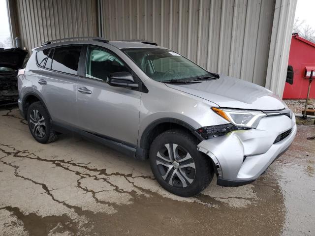 2T3ZFREV1JW439719 - 2018 TOYOTA RAV4 LE SILVER photo 4