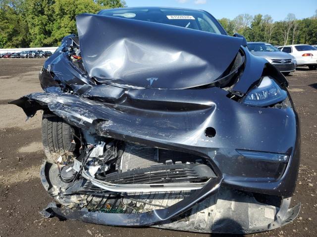 7SAYGDED3SF266122 - 2025 TESLA MODEL Y ნაცრისფერი ფოტო 5