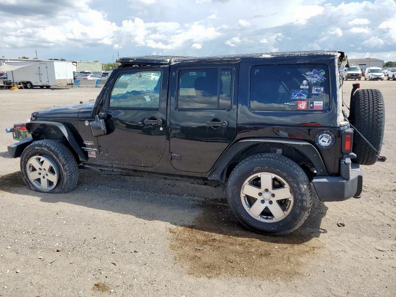 1J4HA5H17BL542623 - 2011 JEEP WRANGLER U SAHARA შავი ფოტო 2