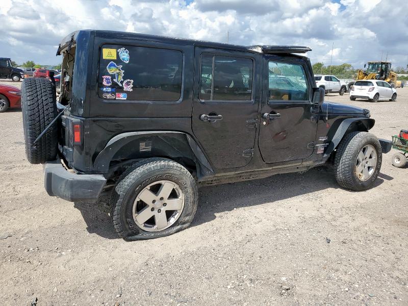 1J4HA5H17BL542623 - 2011 JEEP WRANGLER U SAHARA შავი ფოტო 3