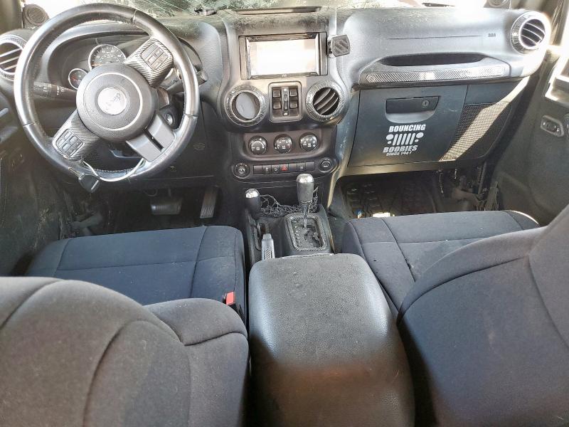 1J4HA5H17BL542623 - 2011 JEEP WRANGLER U SAHARA შავი ფოტო 8