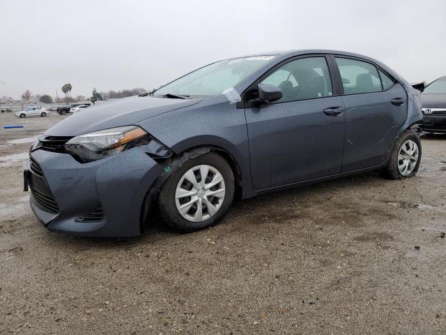 5YFBURHE0HP613867 - 2017 TOYOTA COROLLA L GRAY photo 1