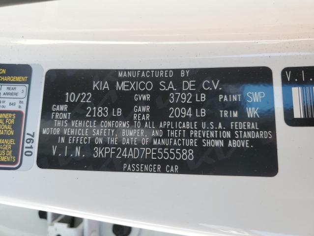 3KPF24AD7PE555588 - 2023 KIA FORTE LX WHITE photo 12