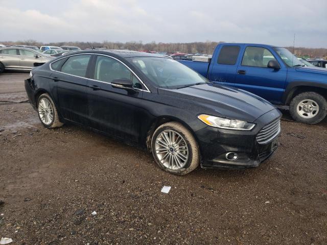 3FA6P0H91GR328083 - 2016 FORD FUSION SE BLACK photo 4