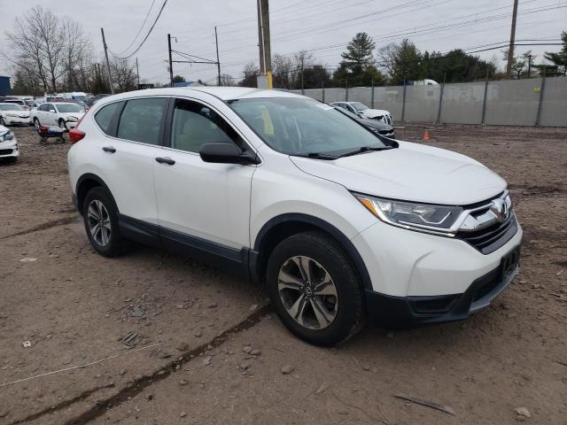 2HKRW6H33KH224697 - 2019 HONDA CR-V LX WHITE photo 4