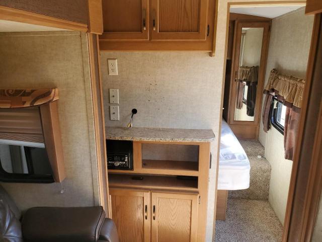 4YDT29921DB454040 - 2013 KEYSTONE OUTBACK Белый фото 5