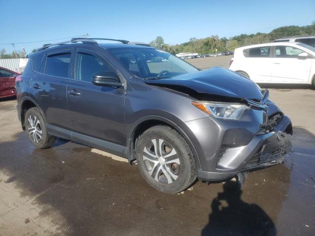 JTMBFREV7HJ144568 - 2017 TOYOTA RAV4 LE Gris photo 4