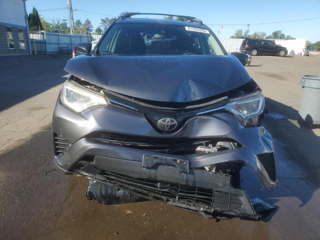 JTMBFREV7HJ144568 - 2017 TOYOTA RAV4 LE Gris photo 5