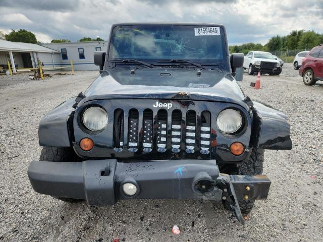 1C4HJWEGXCL223139 - 2012 JEEP WRANGLER UNLIMITED SAHARA BLACK photo 5