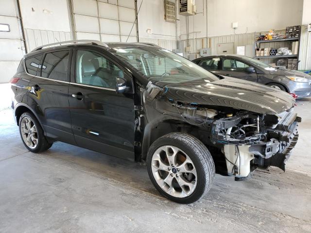 1FMCU9JX5EUD85388 - 2014 FORD ESCAPE TITANIUM BLACK photo 4