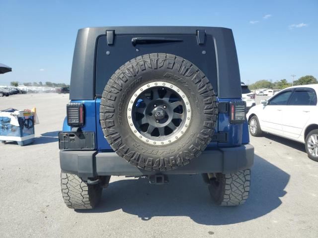 1J4GA59169L770214 - 2009 JEEP WRANGLER UNLIMITED SAHARA BLUE photo 6