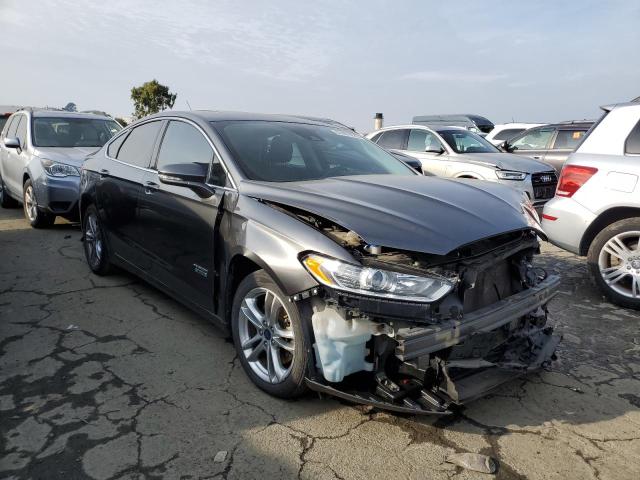 3FA6P0SU8GR134664 - 2016 FORD FUSION TITANIUM PHEV GRAY photo 4