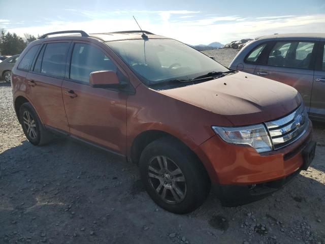 2FMDK48C97BB36598 - 2007 FORD EDGE SEL ORANGE photo 4