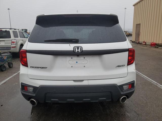 5FNYF8H55PB011149 - 2023 HONDA PASSPORT EXL WHITE photo 6