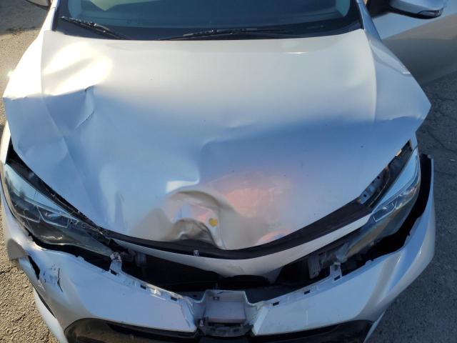 5YFBURHE3KP871050 - 2019 TOYOTA COROLLA L Srebrny zdjęcie 11