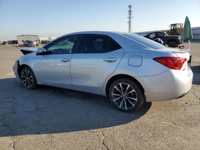 5YFBURHE3KP871050 - 2019 TOYOTA COROLLA L Srebrny zdjęcie 2