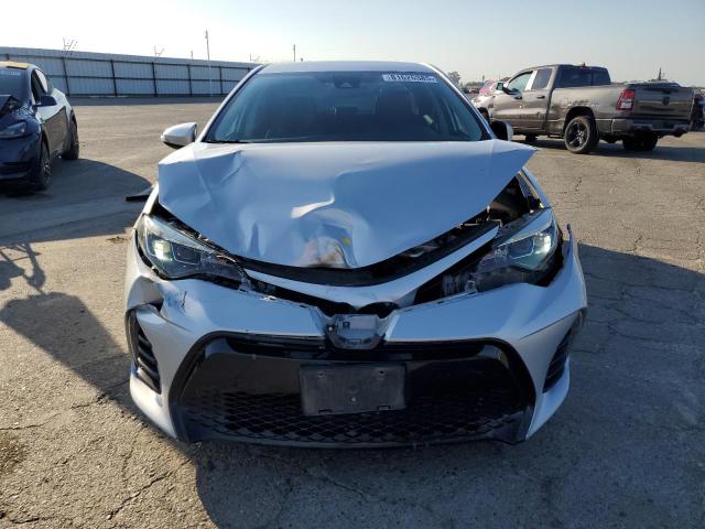 5YFBURHE3KP871050 - 2019 TOYOTA COROLLA L Srebrny zdjęcie 5