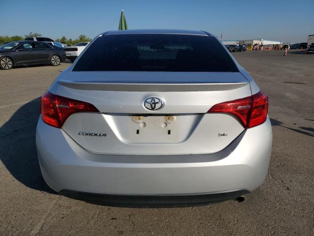 5YFBURHE3KP871050 - 2019 TOYOTA COROLLA L Srebrny zdjęcie 6