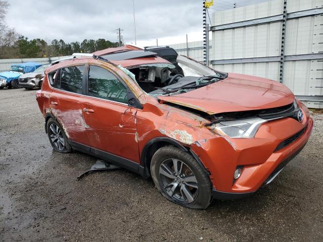 2T3WFREV8GW285490 - 2016 TOYOTA RAV4 XLE ORANGE photo 4