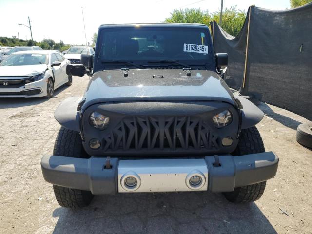 1C4HJWEG2DL686023 - 2013 JEEP WRANGLER U SAHARA أسود صورة 5