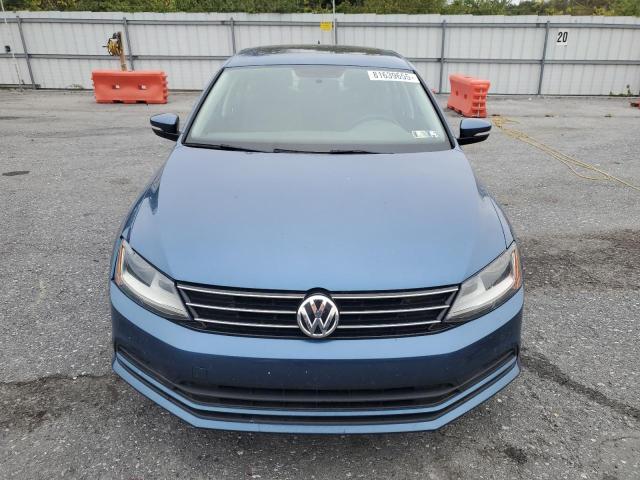 3VWB67AJ7HM361609 - 2017 VOLKSWAGEN JETTA SE BLUE photo 5
