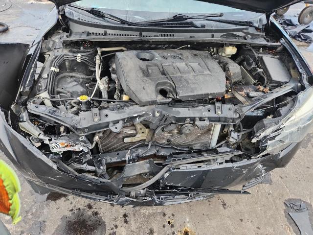 5YFBURHE9HP657706 - 2017 TOYOTA COROLLA L BLACK photo 11