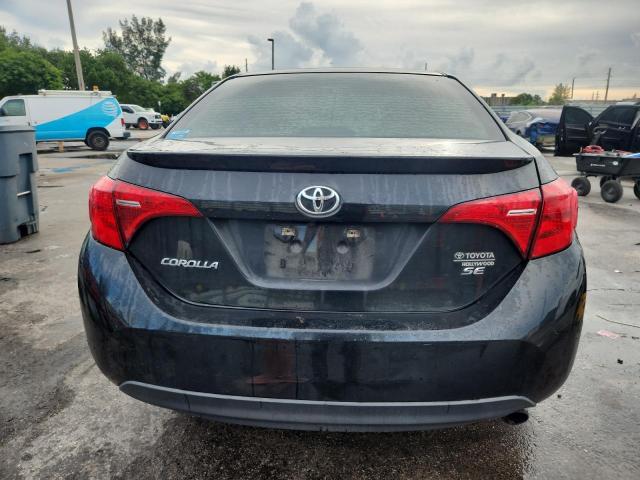 5YFBURHE9HP657706 - 2017 TOYOTA COROLLA L BLACK photo 6