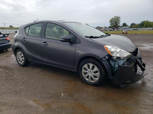 JTDKDTB33E1573871 - 2014 TOYOTA PRIUS C Grau Foto 4