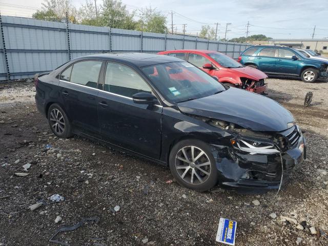 3VWDB7AJ8HM294958 - 2017 VOLKSWAGEN JETTA SE BLACK photo 4