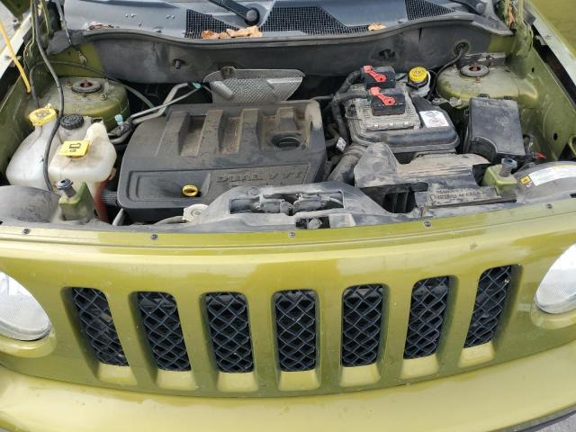 1C4NJRBB8CD558956 - 2012 JEEP PATRIOT SPORT Grün Foto 11