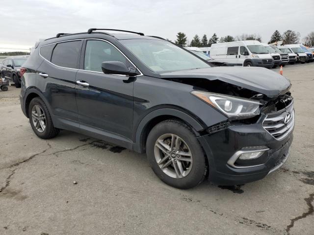 5NMZUDLB4HH001728 - 2017 HYUNDAI SANTA FE S BLACK photo 4