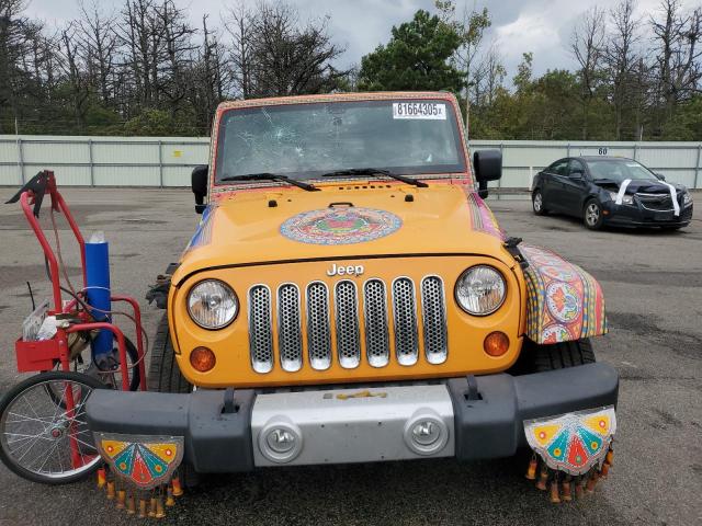 1C4HJWEGXDL515262 - 2013 JEEP WRANGLER U SAHARA ნარინჯისფერი ფოტო 5