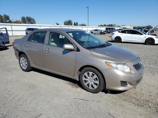 1NXBU40E29Z059939 - 2009 TOYOTA COROLLA BASE Dorado foto 4