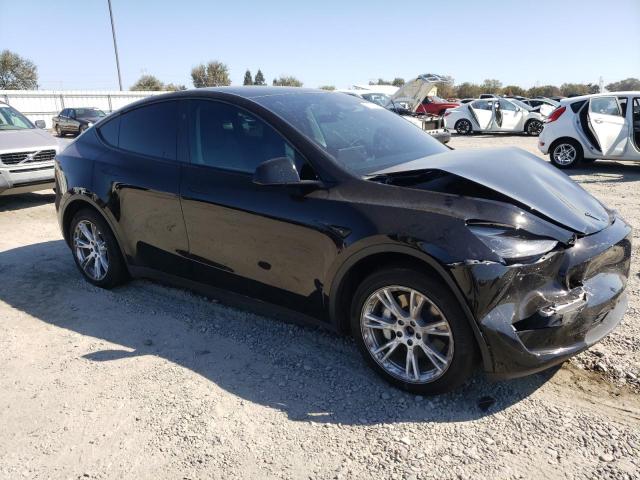 7SAYGDEEXPF792229 - 2023 TESLA MODEL Y BLACK photo 4