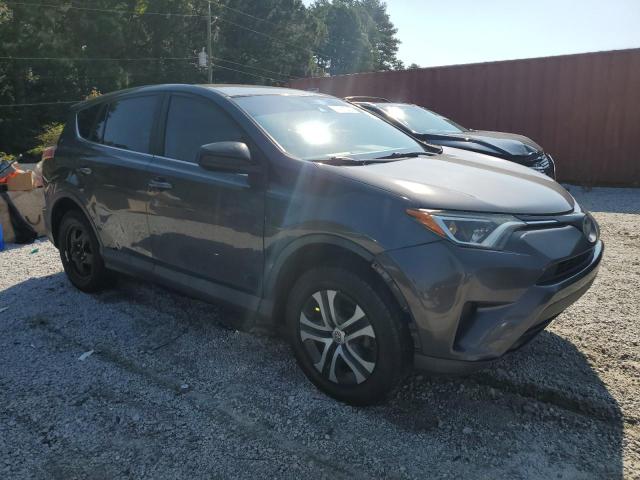 2T3ZFREV9JW426880 - 2018 TOYOTA RAV4 LE Gris photo 4