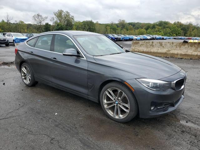 WBA8Z9C57JG827701 - 2018 BMW 330 XIGT GRAY photo 4