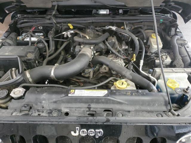 1J4BA5H13BL501072 - 2011 JEEP WRANGLER U SAHARA შავი ფოტო 11