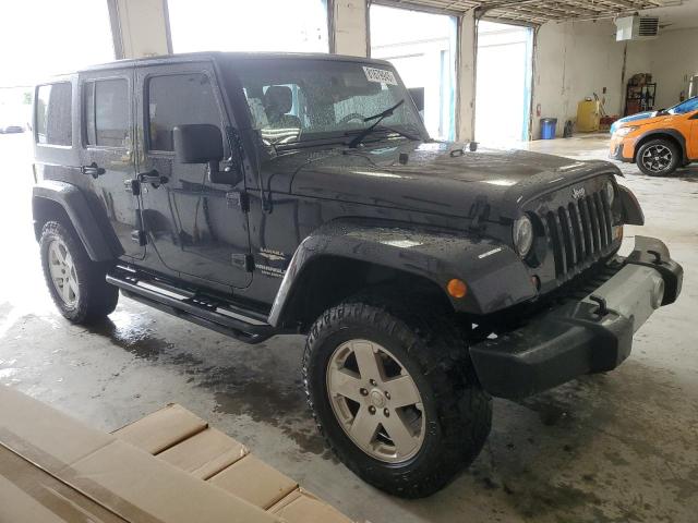 1J4BA5H13BL501072 - 2011 JEEP WRANGLER U SAHARA შავი ფოტო 4