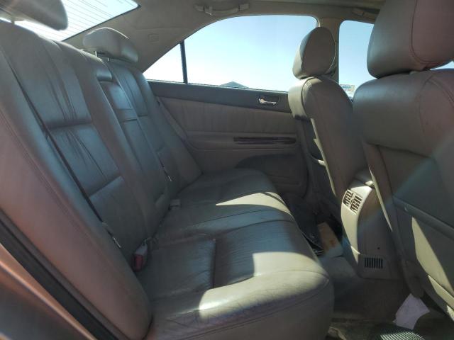 JTDBF30K120086139 - 2002 TOYOTA CAMRY LE GOLD photo 10