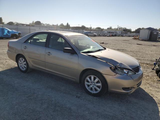 JTDBF30K120086139 - 2002 TOYOTA CAMRY LE GOLD photo 4