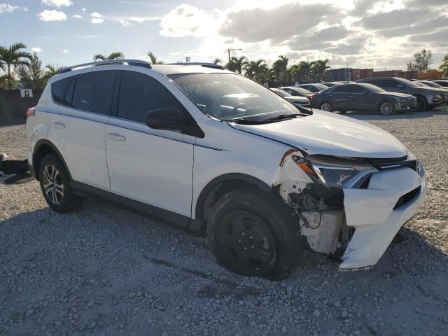 JTMZFREV6GJ098762 - 2016 TOYOTA RAV4 LE WHITE photo 4