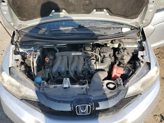 JHMGK5H59GX013447 - 2016 HONDA FIT LX SILVER photo 11