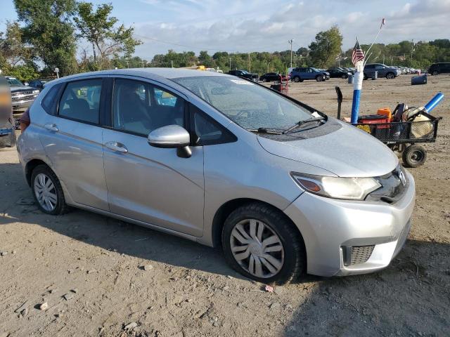 JHMGK5H59GX013447 - 2016 HONDA FIT LX SILVER photo 4