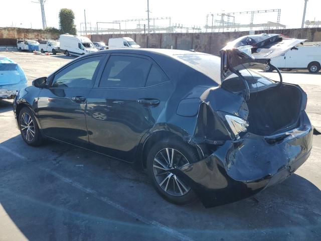5YFBURHE0GP507899 - 2016 TOYOTA COROLLA L შავი ფოტო 2
