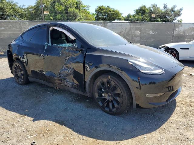7SAYGDEE8NF345735 - 2022 TESLA MODEL Y შავი ფოტო 4